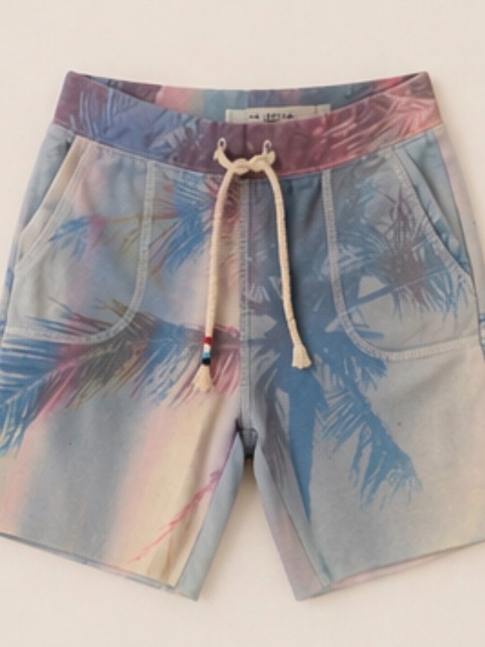 Sol Angeles girls shorts. Size 8. Print of blue, pink, lavender.